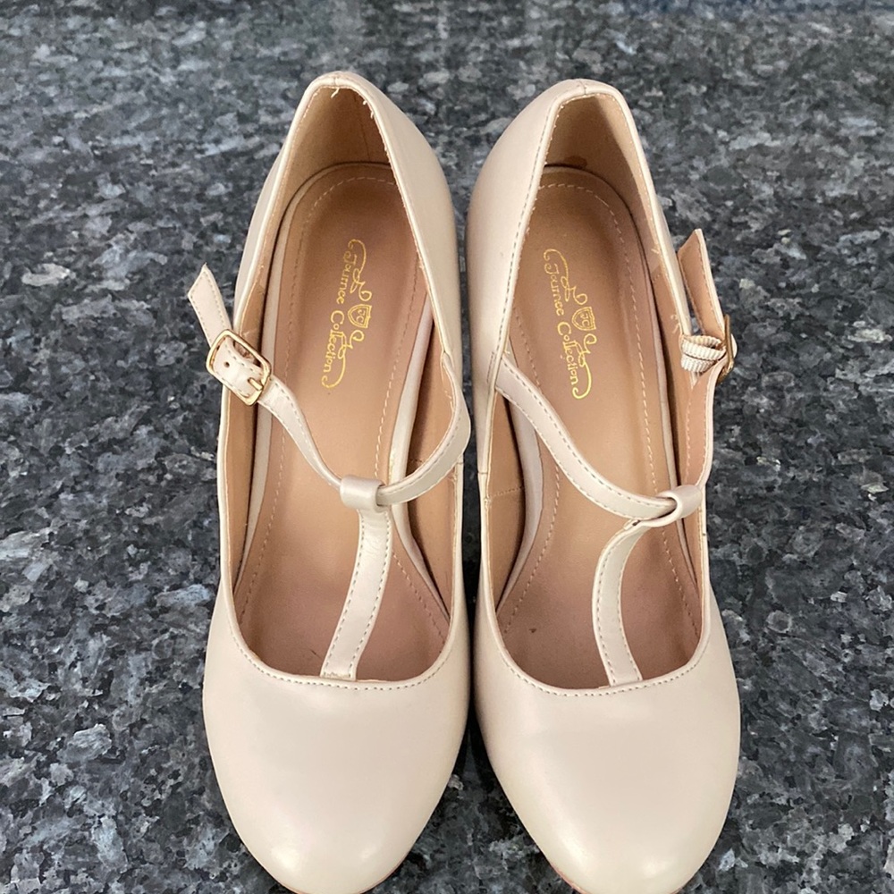 Like new—Women’s Cream Retro T-strap pumps size 7